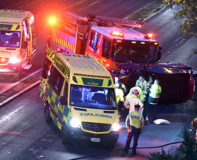 St John Ambulance officers, firefighters and police join forces to help at the scene of a fatal...