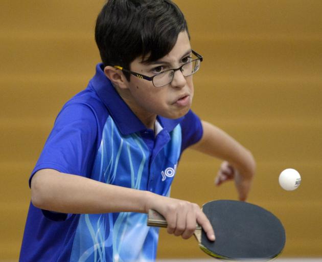 Jayden Ralston (Canterbury) in action during a BS13 match at the Otago Table Tennis Open held in...