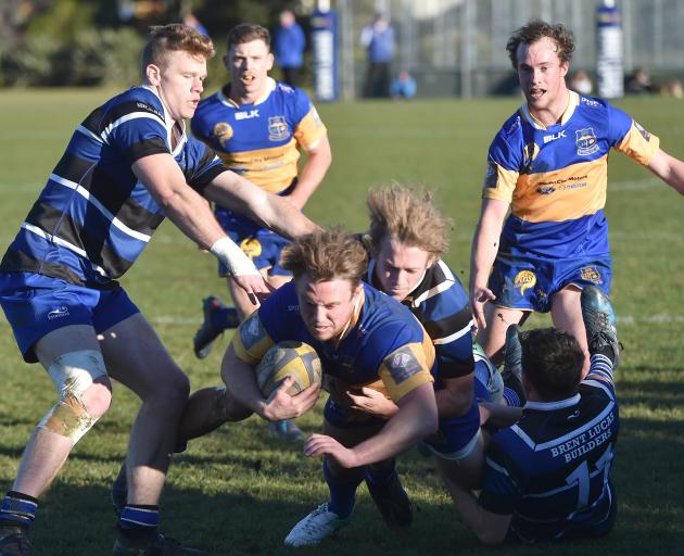 Taieri go over for a try during their thrilling win over Kaikorai at Bishopscourt today. Photo: ODT