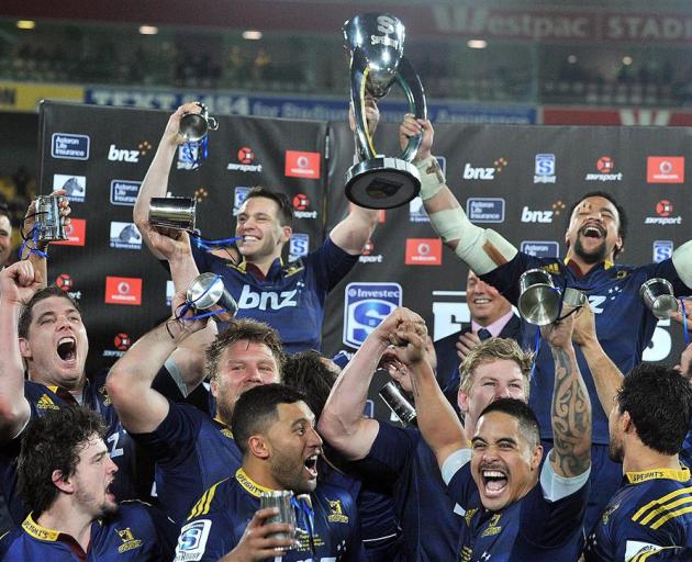 The Highlanders celebrate winning the Super rugby final in Wellington in July. Photo by Craig...
