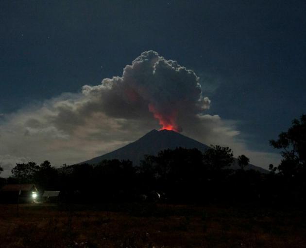 Mount Agung volcano erupts, as seen from Datah Village, Bali. Photo: Antara Foto/Nyoman Budhiana via Reuters