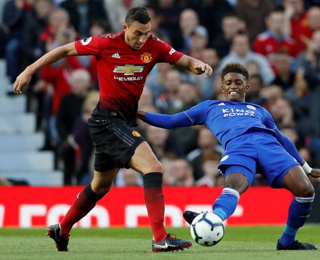 Manchester United’s Matteo Darmian (left) tries to evade the challenge of Leicester City’s Demarai Gray during the opening match of the 2018-19 English Premier League season at Old Trafford in Manchester on Saturday. Spark has secured the rights to the pr