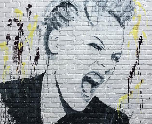 The early stages of a Pink mural. Photo: Supplied