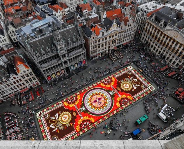 In the carpet's design a bird, commonly found in indigenous Mexican embroidery, is surrounded by illustrations of Mexican fauna and flora. Photo: Reuters In the carpet's design a bird, commonly found in indigenous Mexican embroidery, is surrounded by illustrations of Mexican fauna and flora. Photo: Reuters