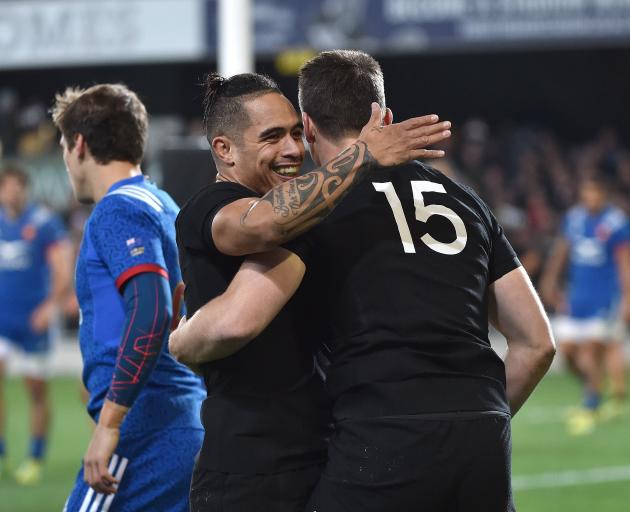 Ben Smith is congratulated by Aaron Smith in the test against France at Forsyth Barr Stadium in June this year. Photo: Peter McIntosh