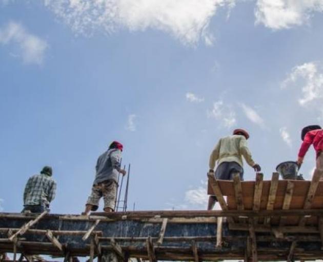 Low pay and poor housing were critical issues identified in a report on migrant construction...