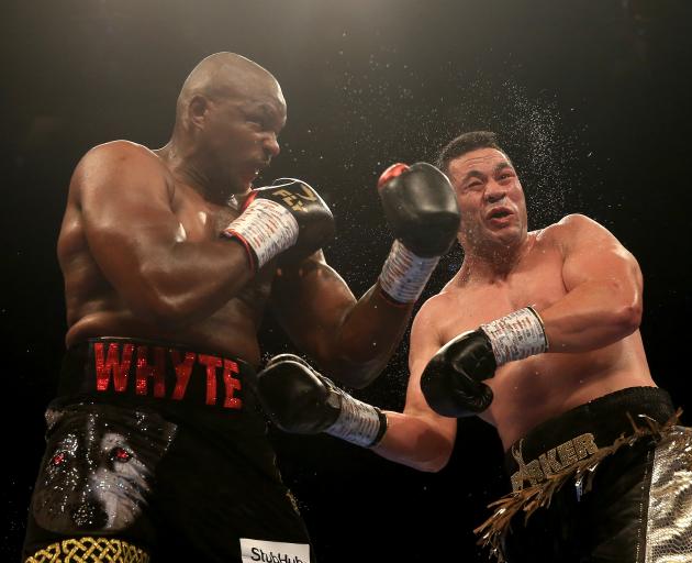 Joseph Parker takes a hit by Dillian Whyte during his loss to the Englishman last month. Photo:...
