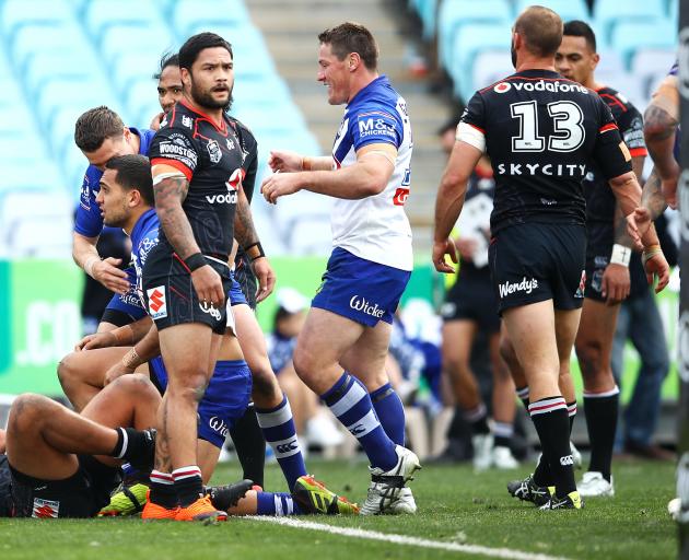 Isaac looks bemused as the Bulldogs celebrate a try. Photo: Getty Images