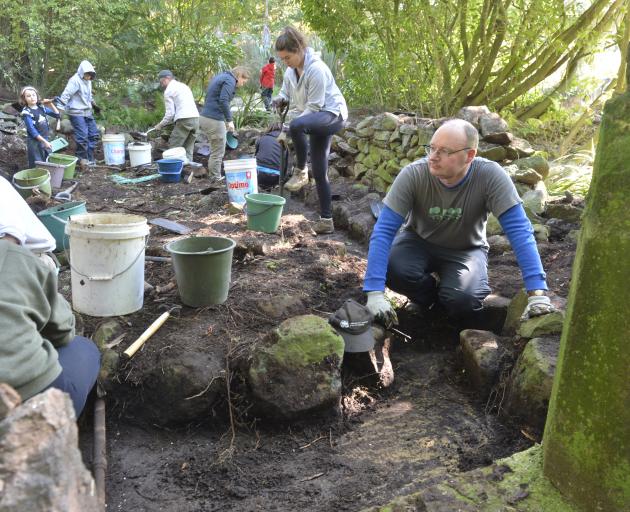 Heritage New Zealand Otago-Southland senior archaeologist Dr Matt Schmidt (right) and a team from...