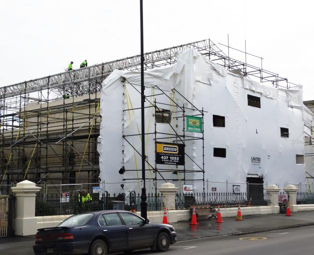 Scaffolding is coming down at the historic Oamaru courthouse in Thames St after six months of earthquake strengthening and other work. Photo: Daniel Birchfield