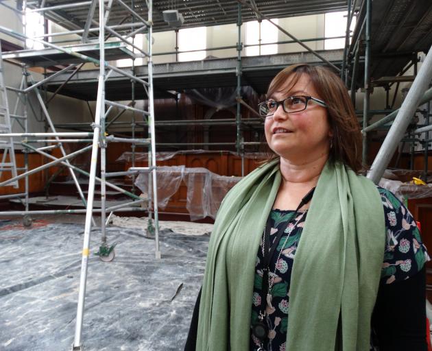 Waitaki District Council property manager Renee Julius inspects work at the historic Oamaru...