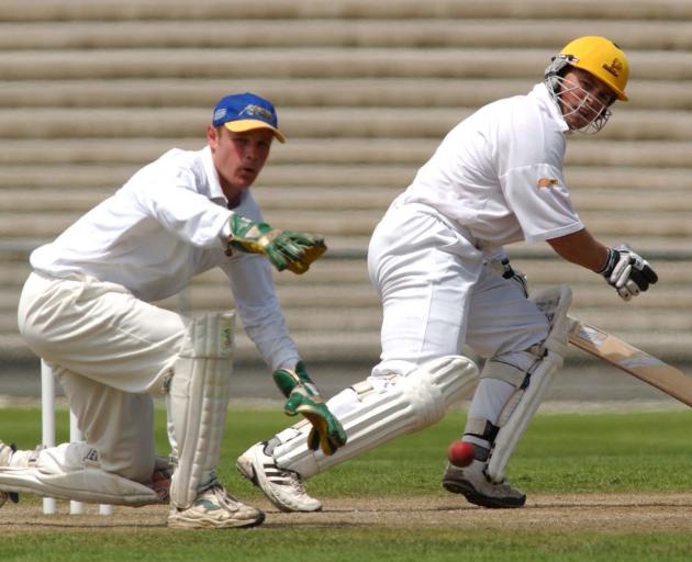 Otago wicketkeeper Martyn Croy watches the ball off the bat of Wellington batsman Matthew Bell in...