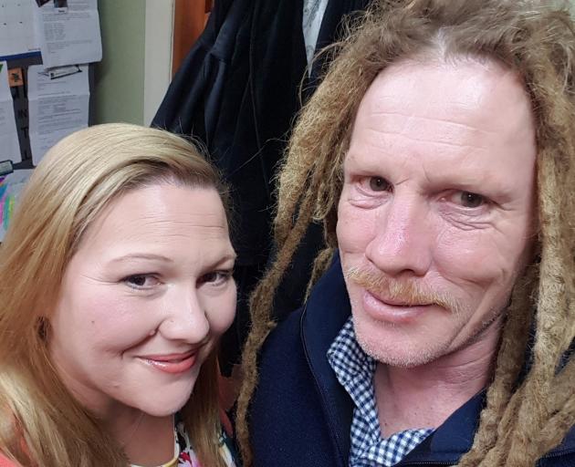 Taieri dairy farmer Simon Andrews and his partner, Natasha O'Neill, before he cut his 14-year-old dreadlocks off. Photos: Supplied