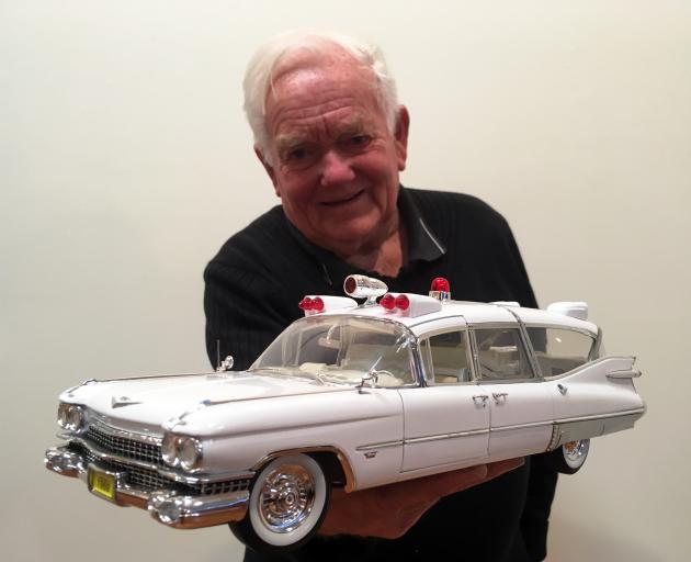 Otago branch of the New Zealand Model Vehicle Club secretary Eric Brockie, of Dunedin, inspects a model of a 1959 Cadillac ambulance in the branch's annual expo in Community Gallery in Princes St. Photo: Shawn McAvinue