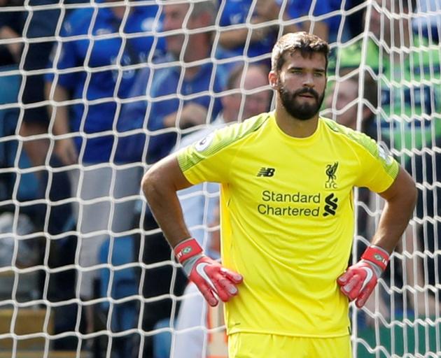 Liverpool's Alisson looks dejected after Leicester City's first goal. Photo: Reuters