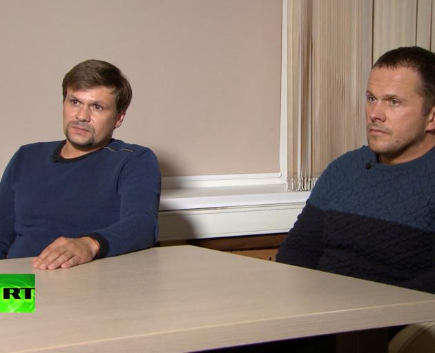 A still image shows two Russian men with the same names as those accused by Britain over Skripal...