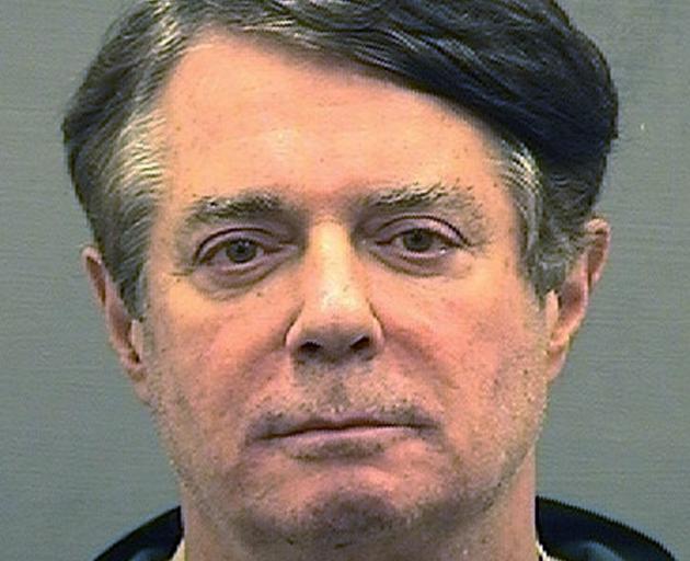 Former Trump campaign manager Paul Manafort is shown in a jail booking photo taken in Alexandria,...