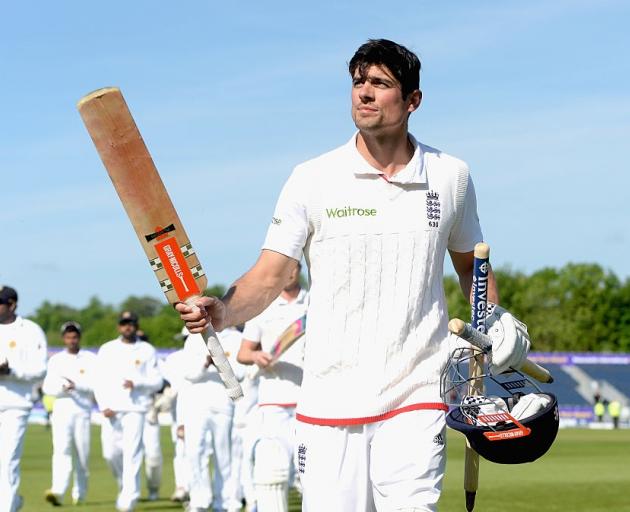 England captain Alistair Cook walks off after scoring a century in his final test innings. Photo:...
