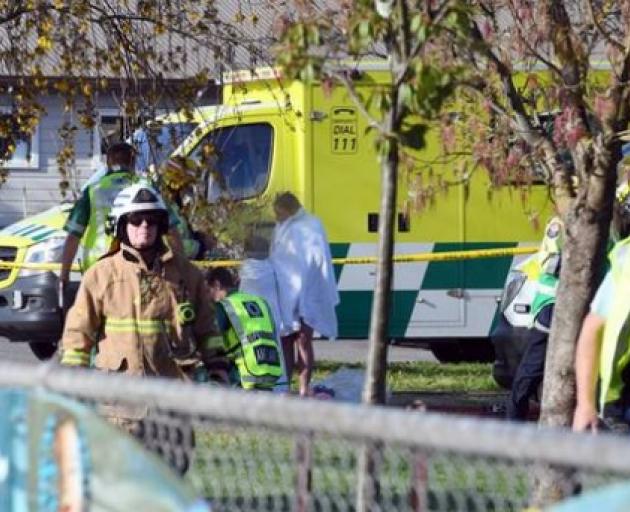 Police and ambulance staff at South End School in Carterton. Students have fallen sick after an...