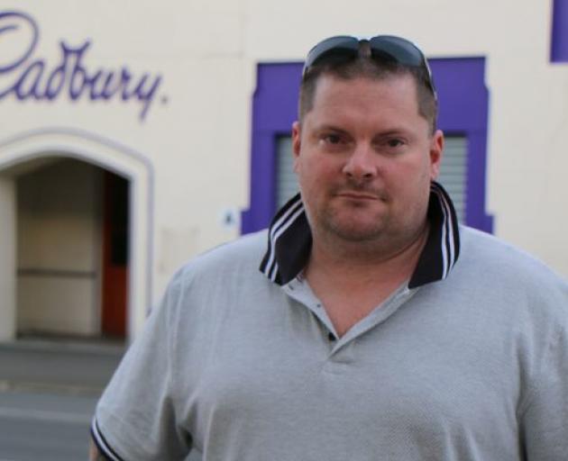 Welch found a job sorting parcels after Cadbury made him redudant - but his pay packet has halved and he doesn't find the new work fulfilling Photo: RNZ / Kate Newton