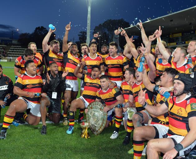 Waikato players celebrate their history repeating feat of taking the Ranfurly Shield off...