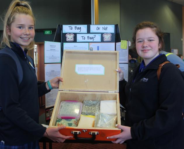 Hauroko Valley Primary pupils Jendi Minty and Tayla Davey-Hubbard (both 12) present their findings on how best to preserve bread. Photo: Sharon Reece