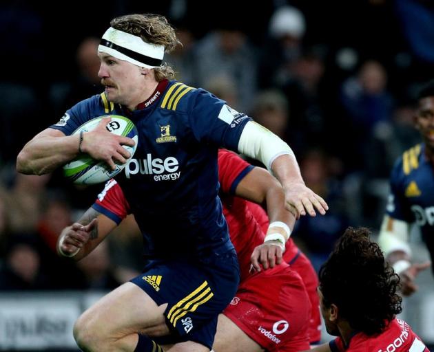 Highlanders flanker James Lentjes on the run against the Crusaders earlier this year. Photo:...