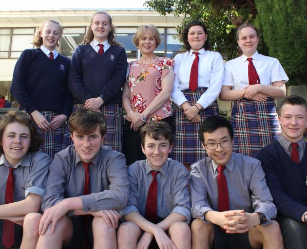 Year 10 pupils from Kavanagh College who recently had success at the Growing NZ Innovation Challenge Day and are enjoying having agribusiness as a subject. Back (from left) Meg Christophers (15), Ella Munro (15), Kavanagh College head of commerce Jill Arm