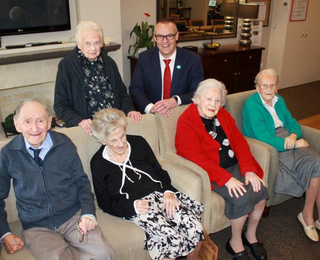 Yvette Williams Retirement Village residents (front, from left) Prof Alan Horsman (99), Monica Wilson (100), Thelma Snow (100), Mary Cochrane  (100), and (rear, from left) Nance Orr (102) with Minister of Health Dr David Clark. Photo: John Lewis