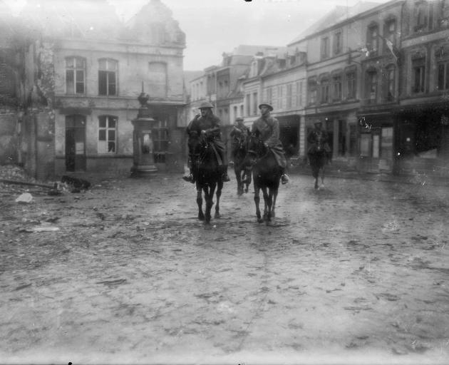 New Zealand Division commanders enter Le Quesnoy the day after its capture.
