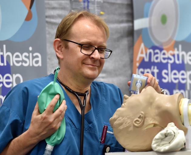 Dunedin Hospital consultant anaesthetist Andrew Smith shows how to ventilate a patient, part of a demonstration to mark National Anaesthesia Day. Photo: Peter McIntosh