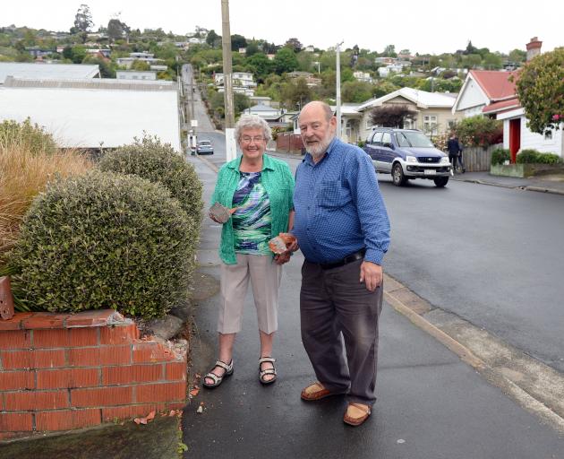 Sam and Coleen Williamson have lived in their home near the bottom of Baldwin St for 26 years and have had their share of issues with tourists who visit the street, including the man who backed a camper van into their garden wall about two months ago.