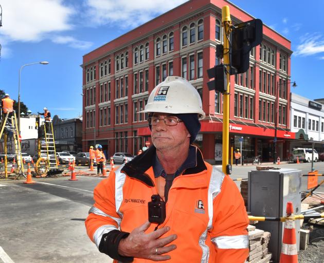 Wearing one of the company's new body cameras is Fulton Hogan site traffic management supervisor...