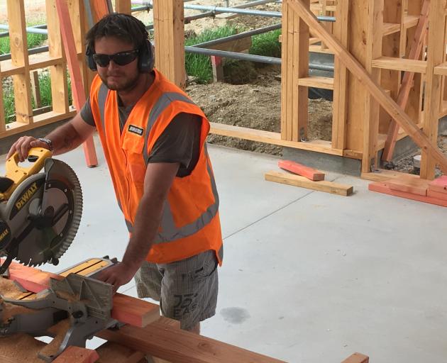 Brett McEwan (34) is one of many adults completing an apprenticeship with Breen Construction. Photo: Alexia Johnston