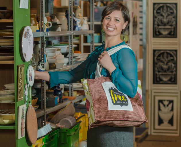 Anna van Riel with a Plastic Bag Free Wanaka upcycled, reusable bag. Photo: supplied 
