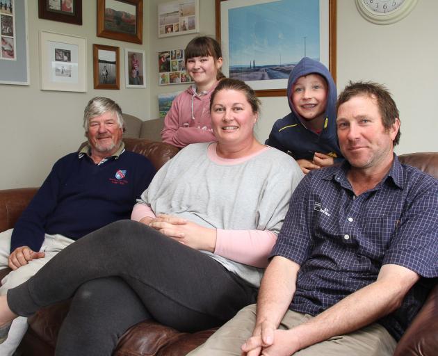 Three generations of Rishworth farming out at Tuapeka West (from left): Ken, Charlotte (8), Bryce’s wife Sheena, Harry (6) and Bryce. Photo: John Cosgrove