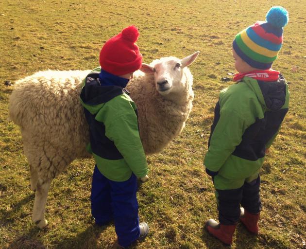 Two Gems children meet a local. Photo: Supplied