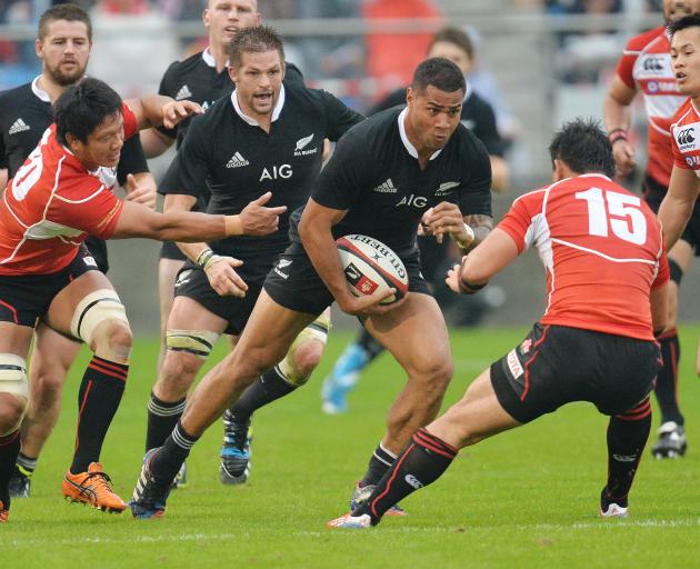 Winger Frank Halai makes a run for the All Blacks when they played Japan in 2013. Photo: Getty...