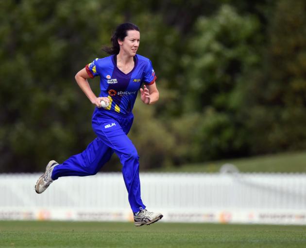 Otago Sparks Australian import Lisa Griffith runs in to bowl against the Central Hinds during...