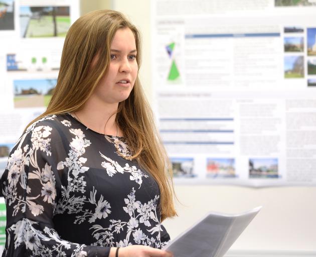 Surveying student Jess Smyth delivers her semester’s work on plans for a development to deal with...