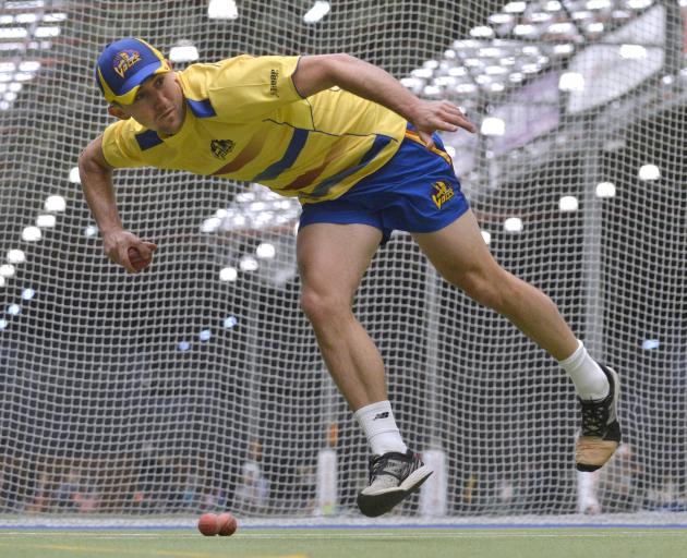 Otago top-order batsman Josh Tasman-Jones flings the ball towards the stumps during a training...