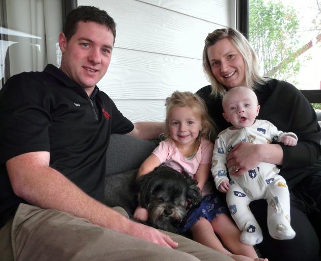 The Sutton family, of Kaitangata, (from left) Gavin, Kyla (3), holding Otis the dog, Tania and 4...
