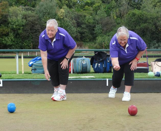 Twins Rose Johnson (left) and Wendy Watson send down a couple of bowls at the South Island...