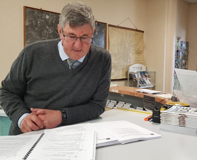 Gore District Council planning consultant Keith Hovell looks over the existing and proposed new...