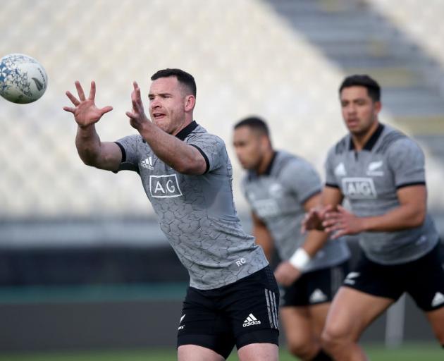 Ryan Crotty catches a pass at All Blacks training. Photo: Getty Images