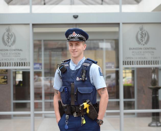 Probationary constable Scott Turner outside the Dunedin Police Station yesterday.PHOTO: LINDA...