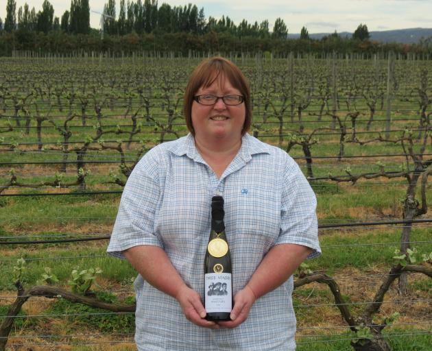 Three Miners Vineyard owners Dr Kirstin Wright, along with husband Paul, of Earnscleugh, were delighted when they and their team won the champion pinot gris trophy in the New Zealand International Wine Show earlier this month. Photo: Yvonne O'Hara
