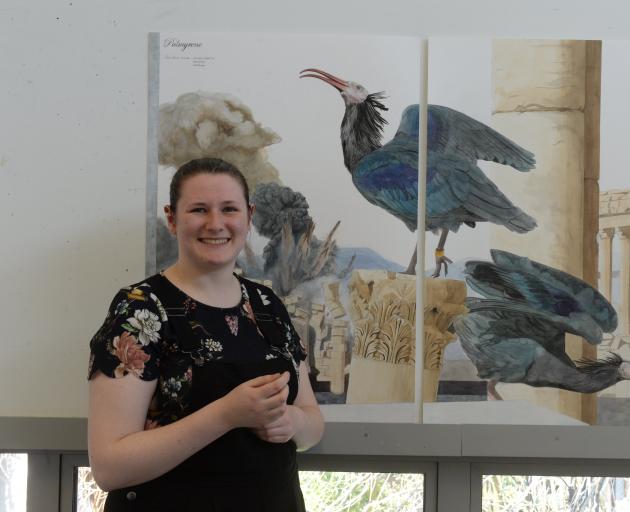 Elaine Mitchell (20) with one of her natural history-inspired works, Palmyrene, depicting the endangered Northern Bald Ibis in Syria. Photo: Linda Robertson
