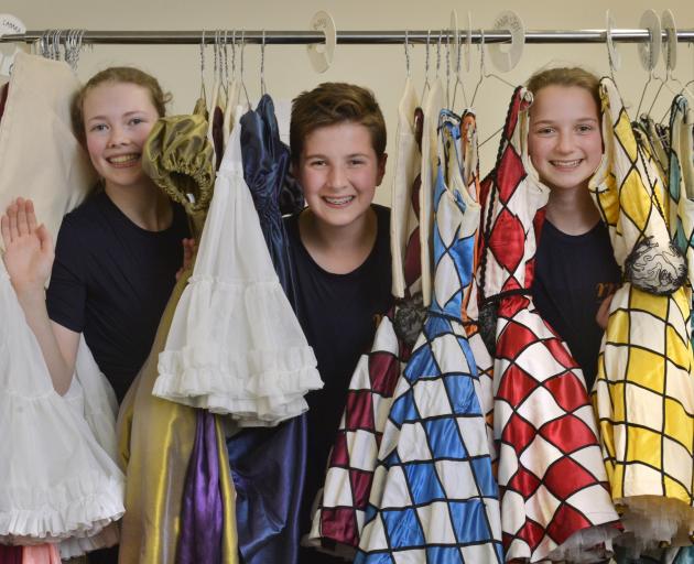 Dunedin dancers Lucy Woodhouse (14), Harry Easton and Victoria Avery (both 13) amid the costumes...