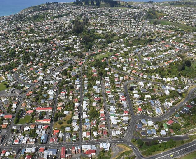 Like much of Otago, Dunedin sales in October rose more than 10% to 215 homes, while the city's median price rose 15.1% to a record $430,500; pictured is the suburb of Caversham, and Corstorphine beyond. Photo: Stephen Jaquiery